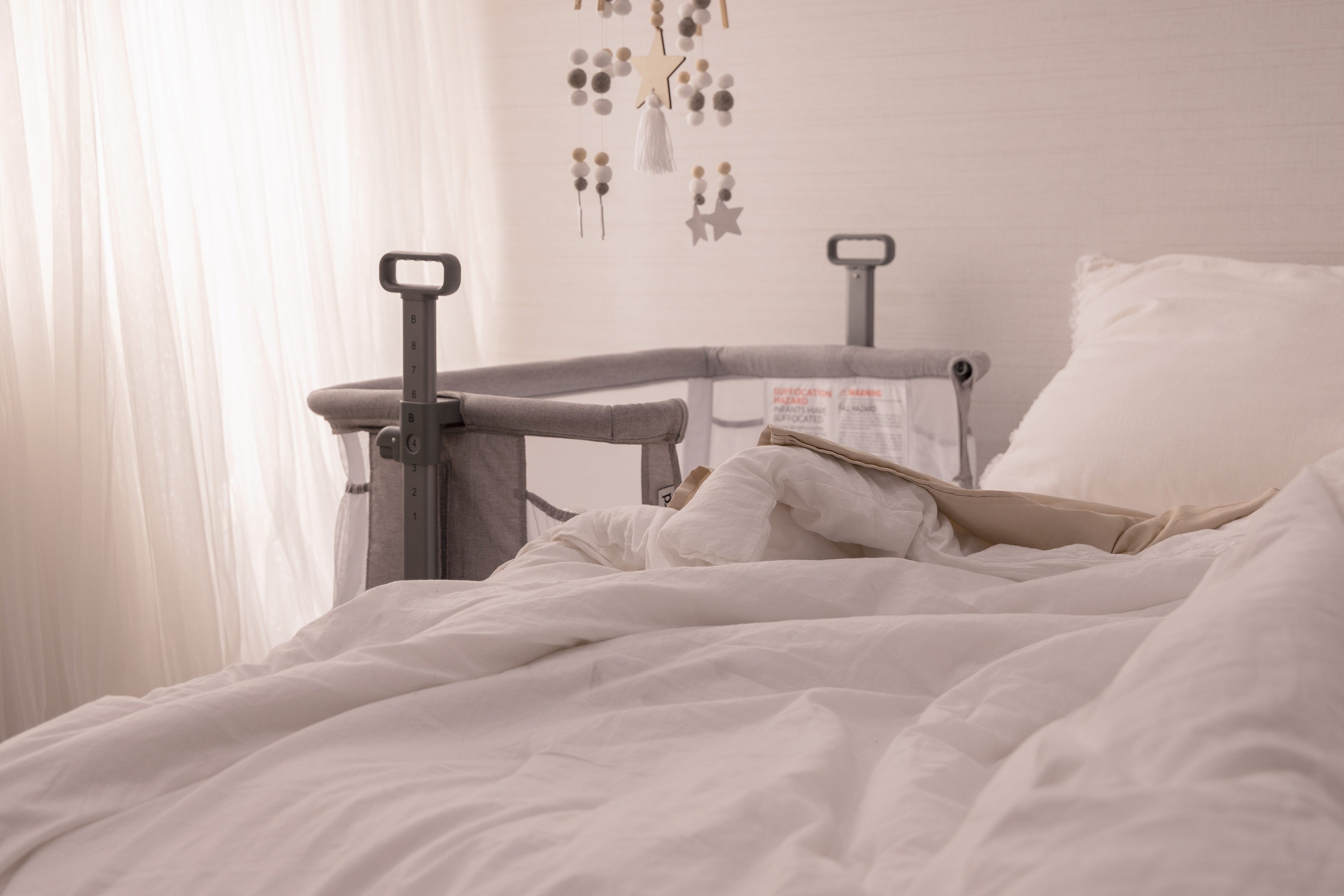 Benefits of a CoSleeper Bedside Sleeper Milliard