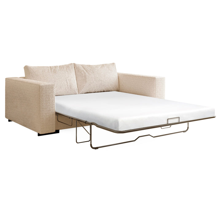 Milliard 4.5-inch premium memory foam replacement mattress on a beige pull-out sleeper sofa